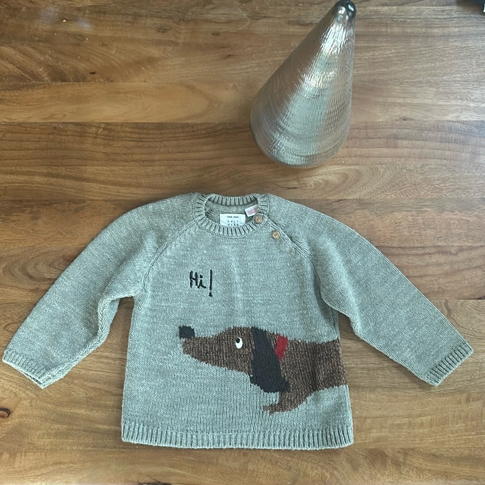 Zara Baby Knit Wear taupe with brown dog sweater, “Hi! Bye!”.